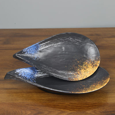 Un bon prix. La triangle 100% exotique de plat de forme de fleur de plat de baisse de l'eau de plat de mélamine a formé en ligne